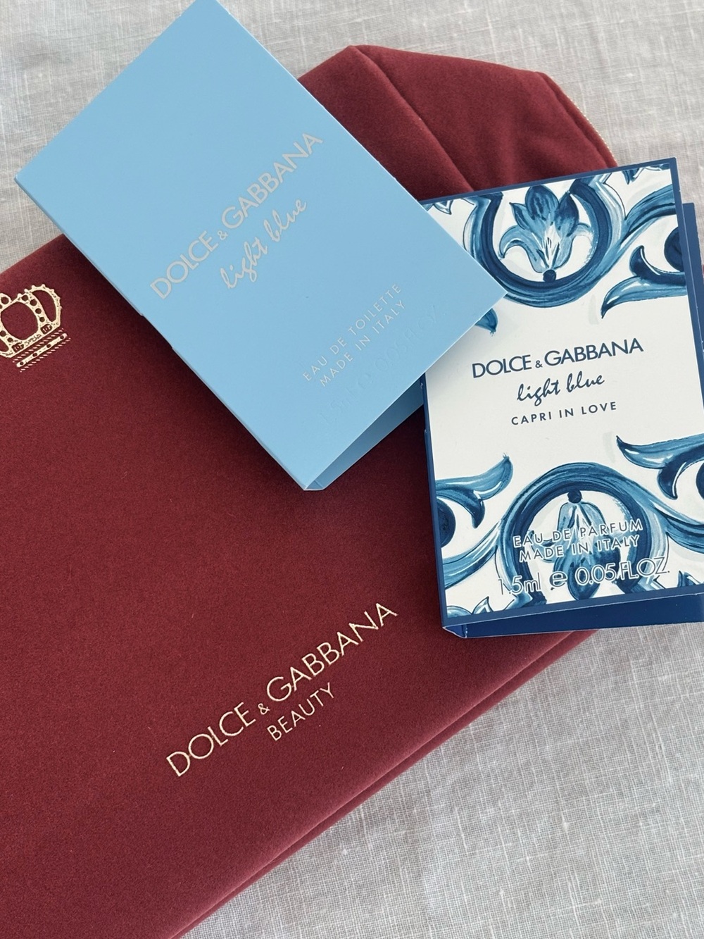 Dolce & Gabbana Muted Red Cosmetic Bag with 2 Fragrance Samples